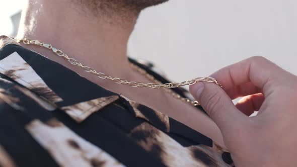 Gold Pendant on a Man Closeup