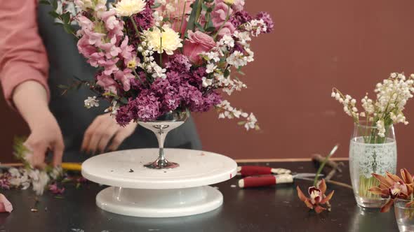 Professional Florist Makes Romantic Floral Bouquet for Event, Working in Flower Salon.