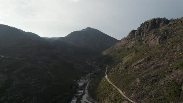 Aerial wide pullback magical 7 lagoons trail on Mountain valley, Gerês National park