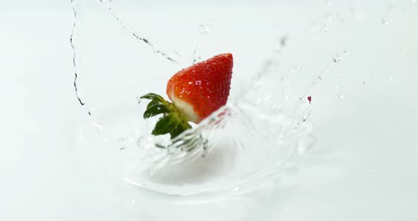 Strawberry, fragaria vesca, Falling on Water, Slow Motion 4K