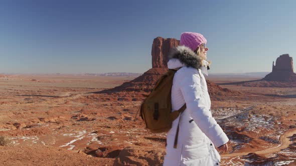 Happy Traveler Looking at Bright Sun Wild West Landscape on Motion Background alt