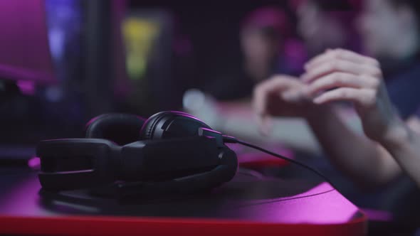 Hands Taking Headphones alt