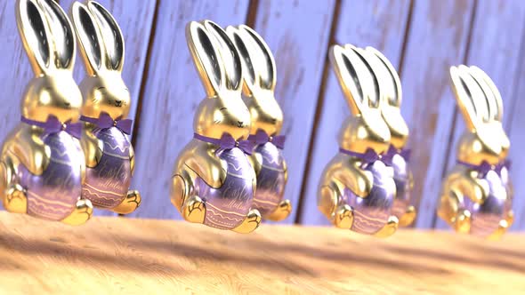 Loopable animation of cute chocolate jumping Easter bunnies.  Happy Easter. alt