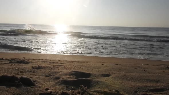 Beautiful Beach sunset, with majestic sky light being reflected. Sunrise beach. sunrise ocean waves.