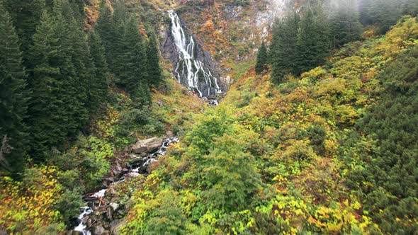 Aerial drone view of nature in Romania. Balea waterfall located in Carpathian mountains alt