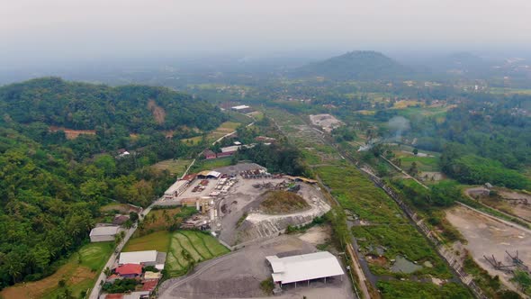 Industrial facility sand processing site in Muntilan, Indonesia, aerial view alt