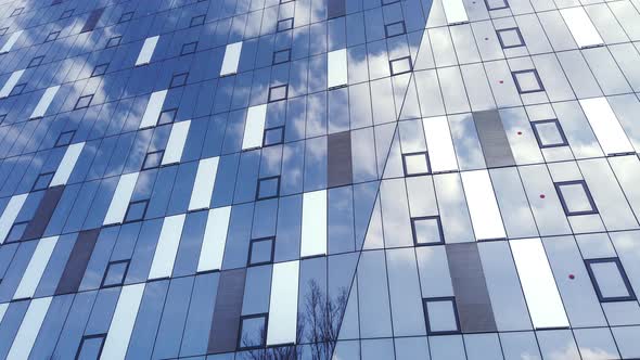 Corporate building Real Estate , office buildings with sky reflections in the glass alt