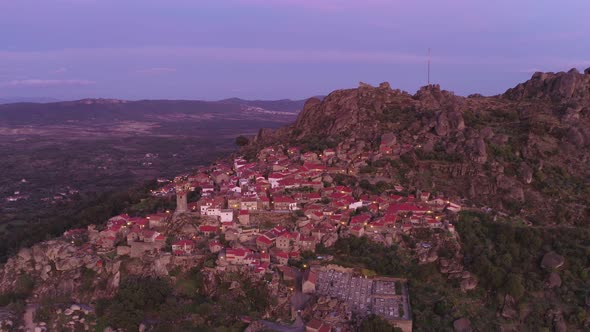 Drone aerial panorama view of Monsanto historic village at sunset, in Portugal alt