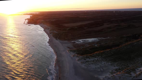 Drone Over Grenen Sandbar At Sunset alt