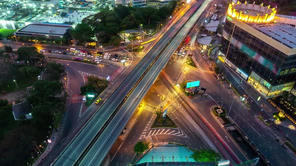 Time Lapse of Busy Highway Road Junction in Metropolis City Center at Night alt