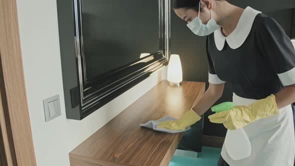 Housekeeper Doing Dusting In Hotel Room, Stock Footage | VideoHive