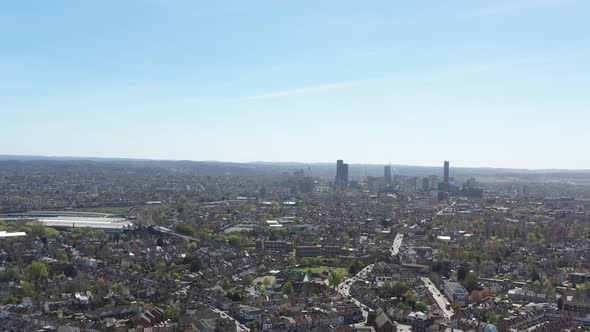 High slider drone shot of Croydon suburban London on a sunny day alt