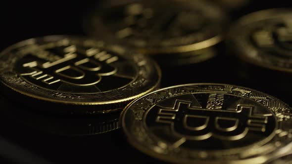 Rotating shot of Bitcoins  alt