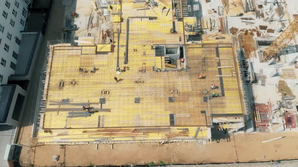 Dron View of Builders Working on a Construction Site
