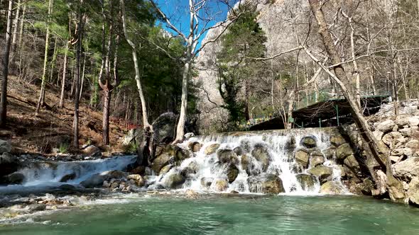 Waterfall on a mountain river aerial view 4 K Turkey Alanya alt