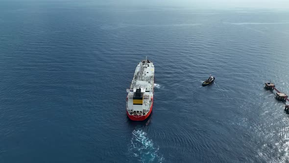 Gas tanker sails out to sea aerial view 4 K Turkey Alanya alt