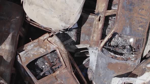 Vertical Video of the Consequences of the War in Ukraine  Destroyed Cars alt