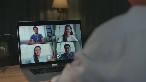 Young Asian Business Man On Video Conference Call, Using Laptop Computer Work Late Night alt