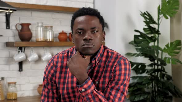 Thoughtful African American Businessman Listens Report Manager Online Video Call alt