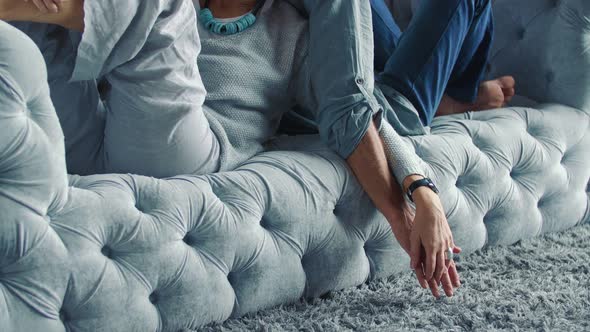 Aged Couple Sitting on the Couch alt