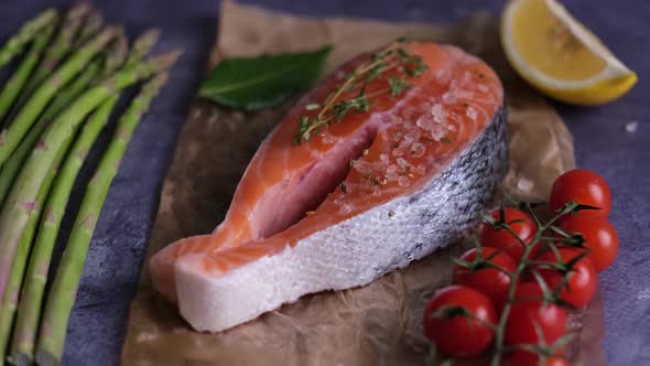 4K - Healthy Food - Atlantic salmon steak with ingredients