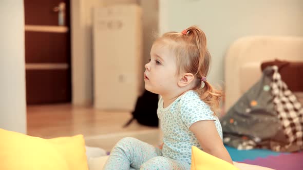 Little Girl Watching Cartoon. Kids Leisure And Entertainment. Children Watching Fairy Tale Story. alt
