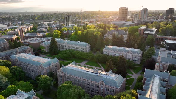 Orbiting aerial of The Quad during sunset at the University of Washington. alt