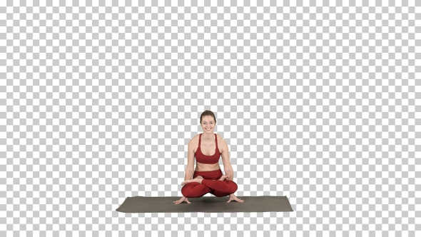Young sporty woman practicing yoga doing Scale exercise, Tolasana alt