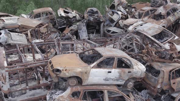 Consequences of the War in Ukraine  Destroyed Cars in Irpin Bucha District alt