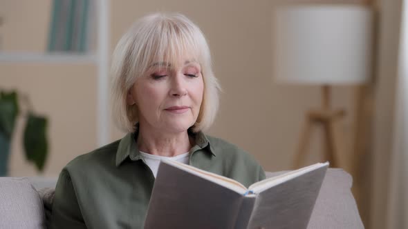 Inspired Dreamy Caucasian Old Woman Mature Lady Senior Grandmother Sitting on Sofa Relaxing at Home alt
