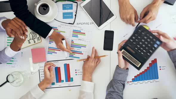 Top View of Colleagues Brainstorming alt