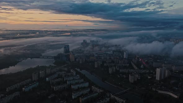 Aerial Panoramic View of Dark City After Rain and Sunset Cloudy Sky Smog Riverscape and Tenement alt