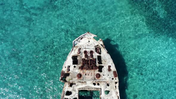 Top View Of The Sunken SS Sapona Concrete-Hulled Ship At The Turquoise Beach In Bahamas. aerial alt