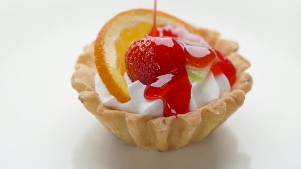 Fruit Dessert Tart with Whipped Cream and Strawberry Topping 