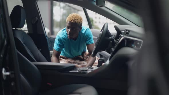 Shooting From Car of African American Man in Wheelchair Entering Vehicle in Slow Motion alt