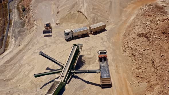 Heavy machines on construction site hyper lapse aerial drone 4k alt