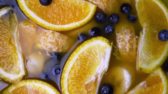 Fresh Summer Drink with Banana Orange and Blueberry