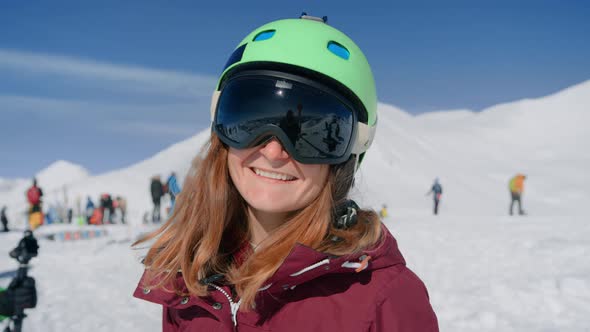 Happy Smiling Woman in Ski Goggles Laugh at Camera alt