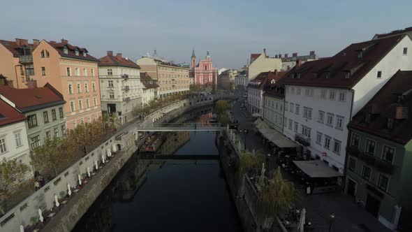 Aerial view of buildings along the river alt