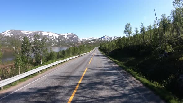 Vehicle Pointofview Driving a Car on a Road in Norway alt