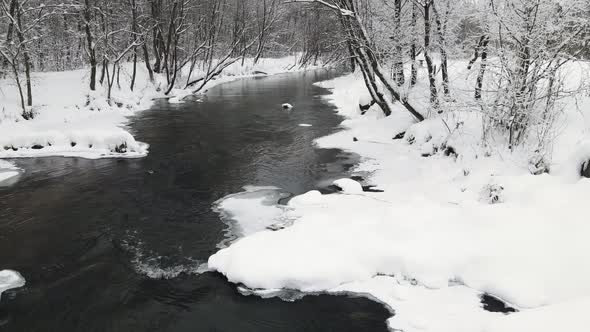 Wonderful Winter Landscape with a Small River Aerial View alt