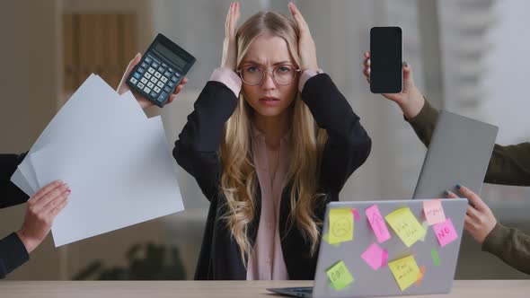 Sad Overworked Exhausted Tired Business Girl with Woman Worker Manager in Glasses Holding Head alt