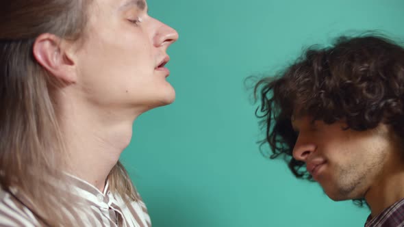 Close Up of Romantic Gay Couple Cuddling and Slowly Dancing Together Isolated alt