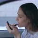 Female Doing Makeup in Car - VideoHive Item for Sale