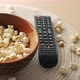 High Angle View of Popcorn and Tv Remote on Table - VideoHive Item for Sale