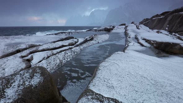 Winter Surf and Hail on a Stone Beach