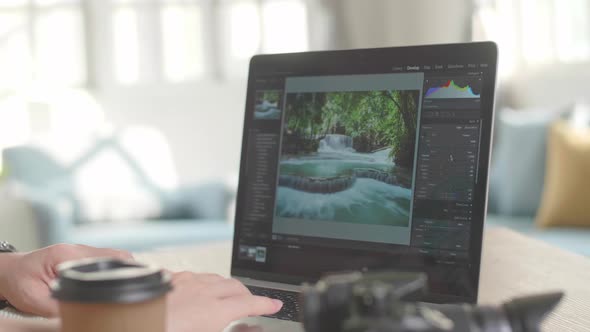 Close Up Man Works In Photo Editing App / Software On His Laptop Computer alt