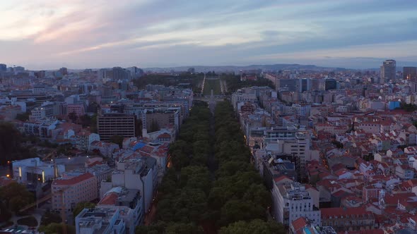 Aerial Slow Dolly in View of Large Public Park Parque Eduardo VII with Lush Green Vegetation in alt