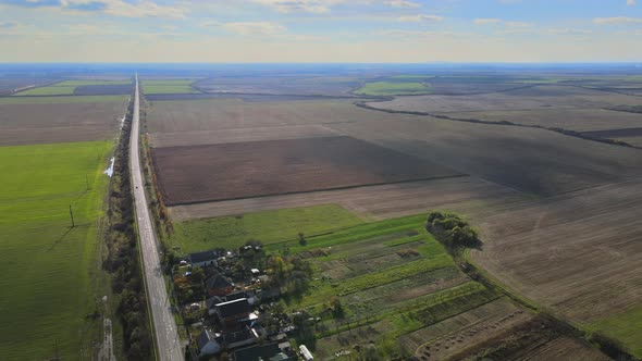 Late Autumn Farmland Meadows Around the Village in the Foreground Houses and Road alt