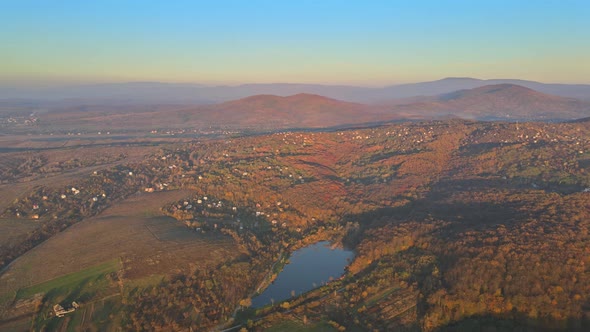 Aerial View Awesome Evening Sunset in Below Panorama Valley on Lake with Mountains alt